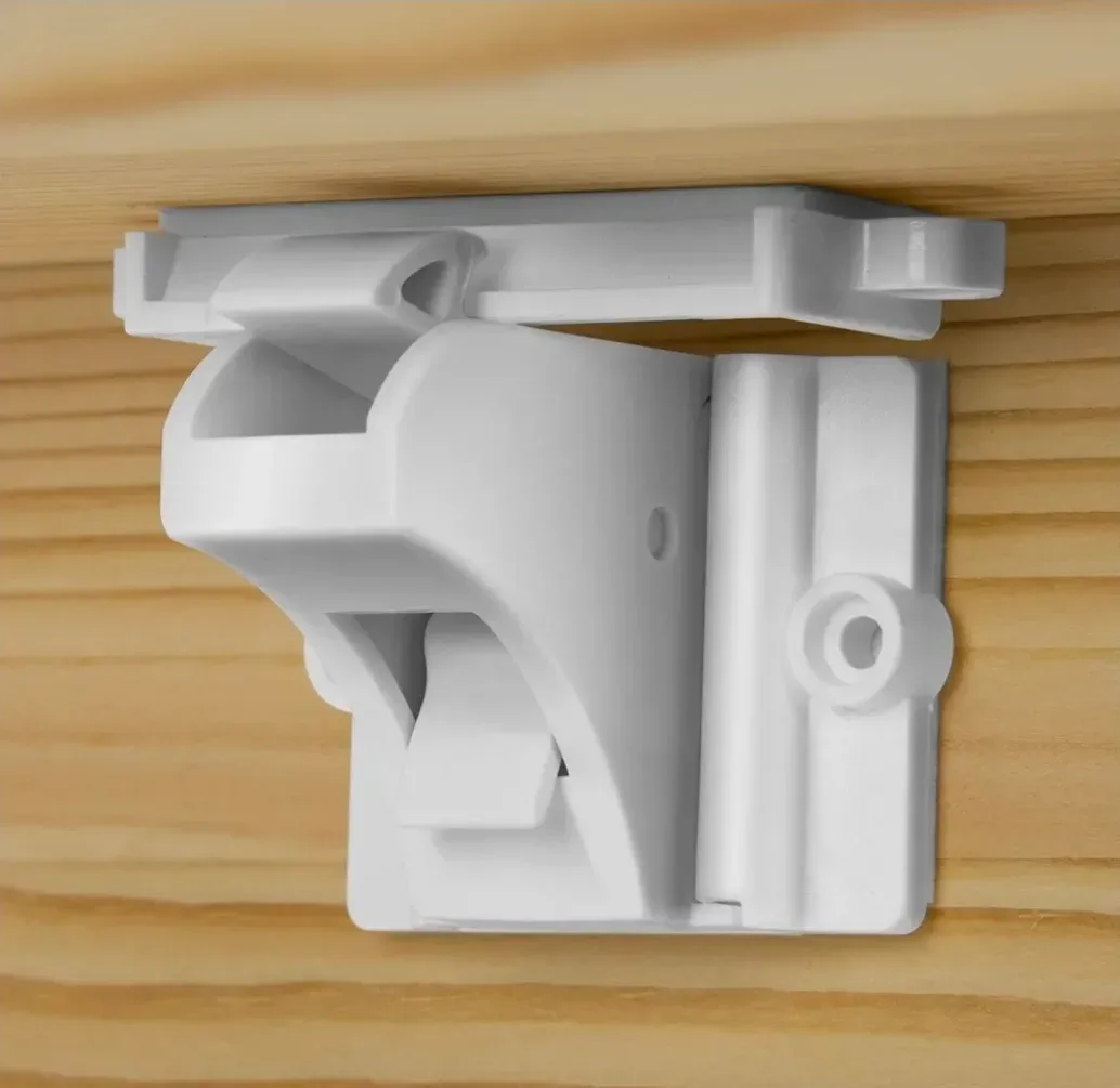 Vmaisi magnetic cabinet lock mounted inside a white kitchen cabinet door with 3M adhesive and optional screws nearby