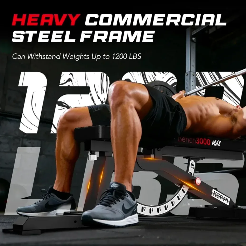 Keppi Bench3000 MAX folded in storage position against a garage gym wall