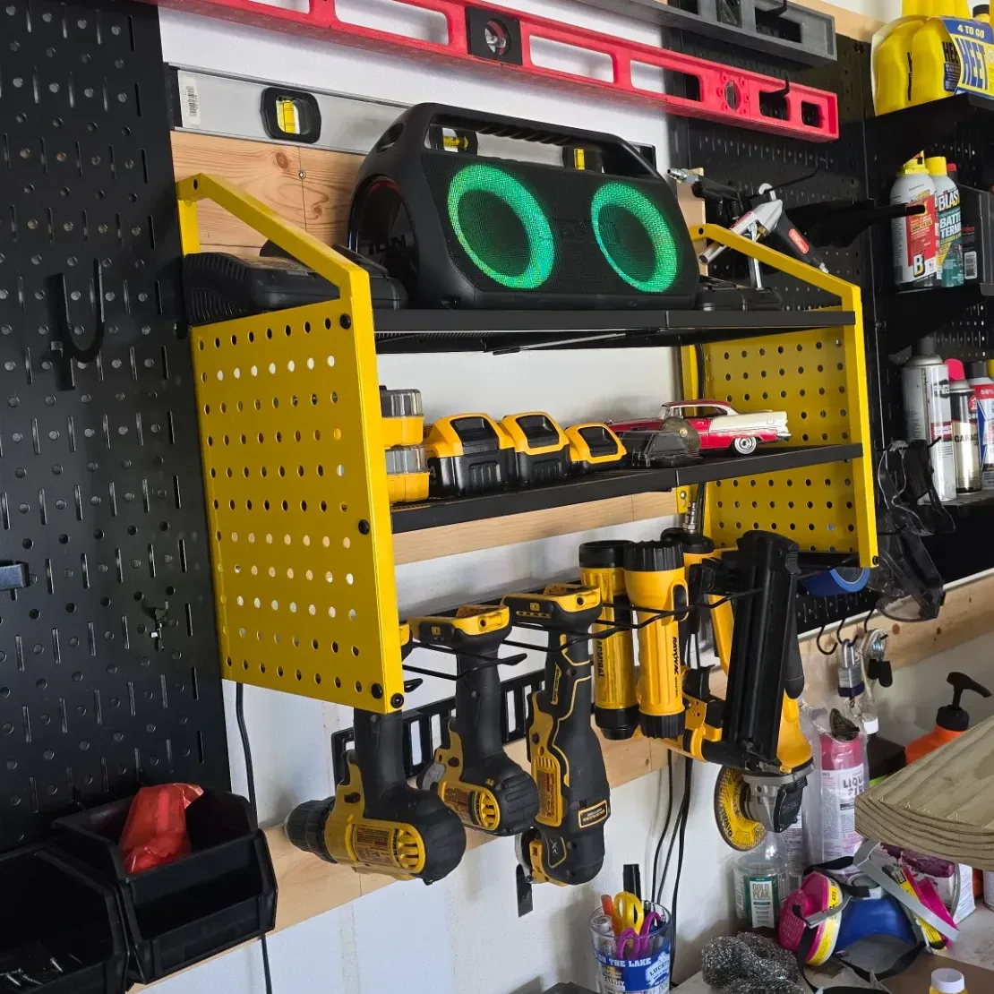 LBT 4-tier power tool organizer fully loaded with cordless tools and batteries in an organized garage workshop.