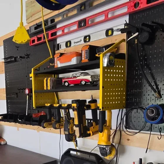 Wire tool cradle on LBT organizer holding a yellow cordless drill, showing the gauge of the wire frame.